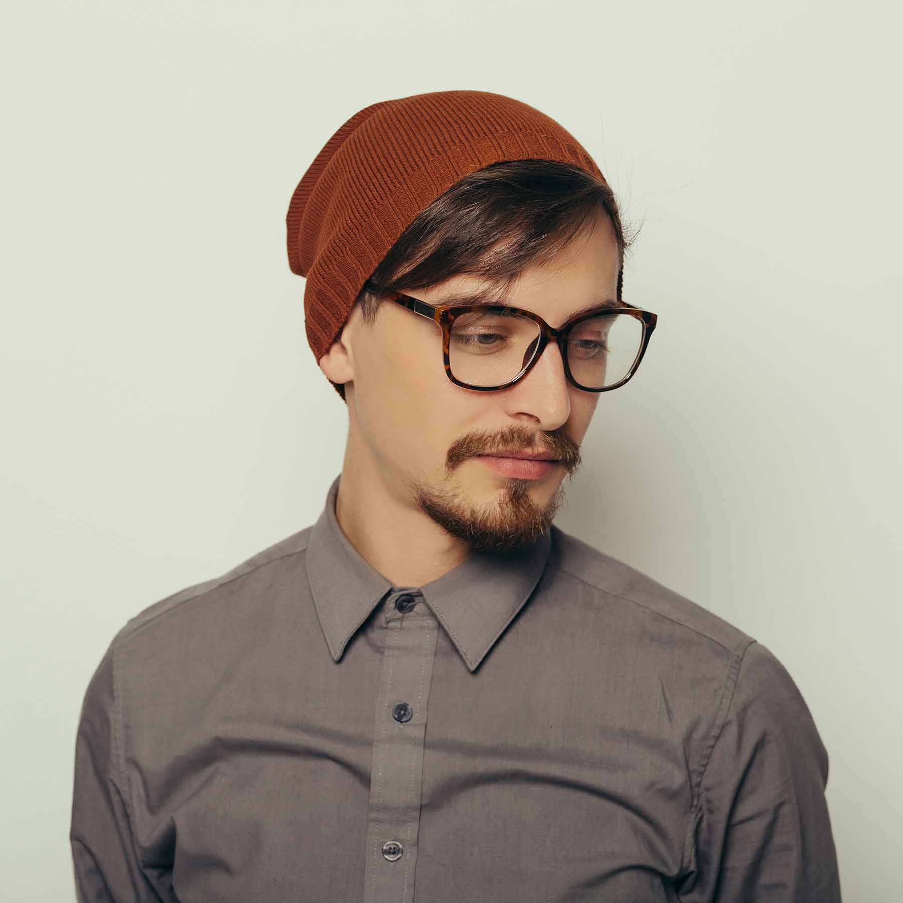 portrait-of-an-interesting-young-man-in-winter-clo-PTK6576-1-1.jpg